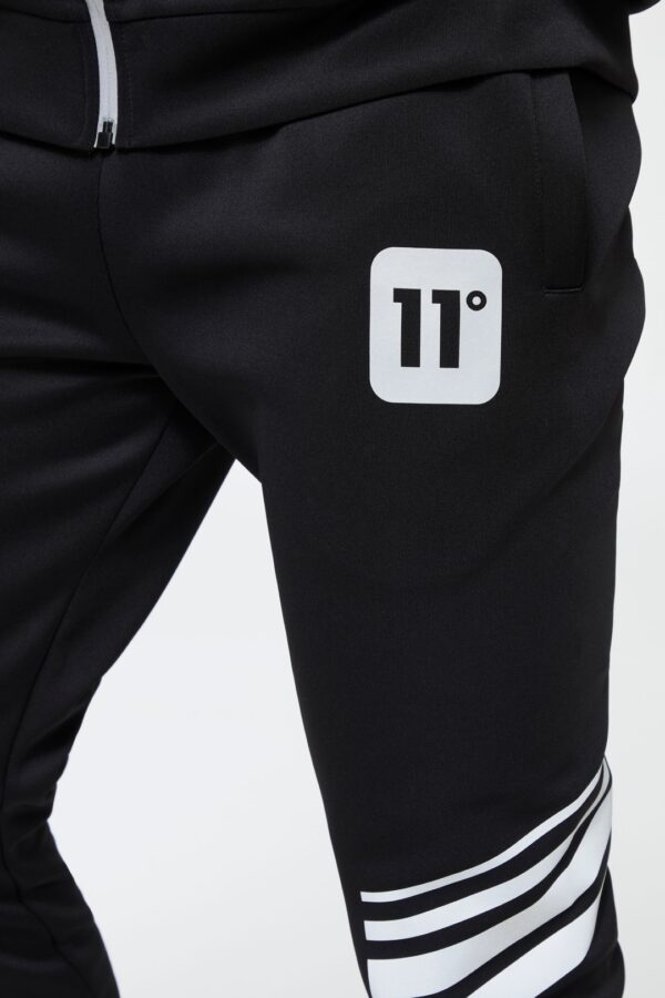 11 DEGREES Pantalon " Stripe Print Trackpants " color negro