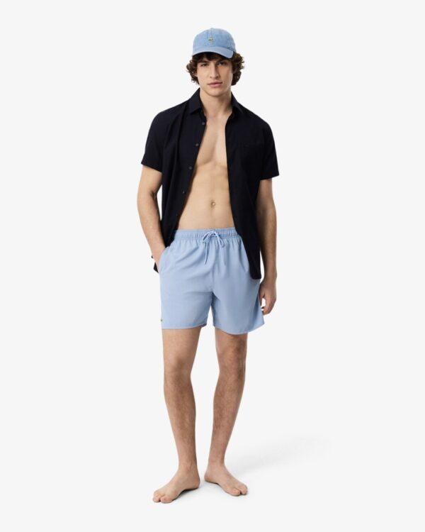 LACOSTEBañador"Mid Length Placed Print Swim Trunks"color celeste