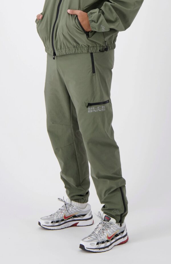 BLACK BANANAS Pantalon " INITIAL TECH TRACKPANTS " color verde