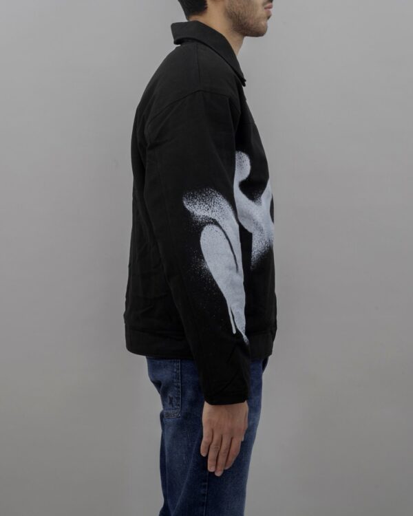 DISCLAIMER Chaqueta color negro