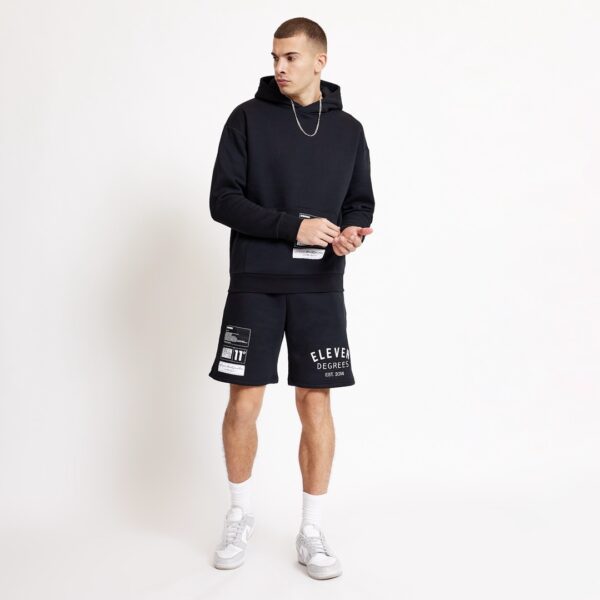11 DEGREES Bermudas " VARSITY GRAPHIC SWEAT SHORTS " color negro