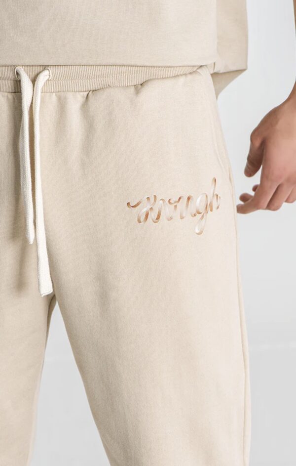 GIANNI KAVANAGH Pantalon " Beige Laced Loose Joggers  " color beige