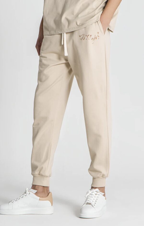 GIANNI KAVANAGH Pantalon " Beige Laced Loose Joggers  " color beige