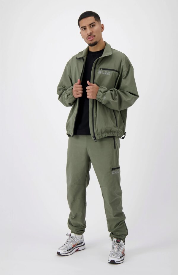 BLACK BANANAS Pantalon " INITIAL TECH TRACKPANTS " color verde